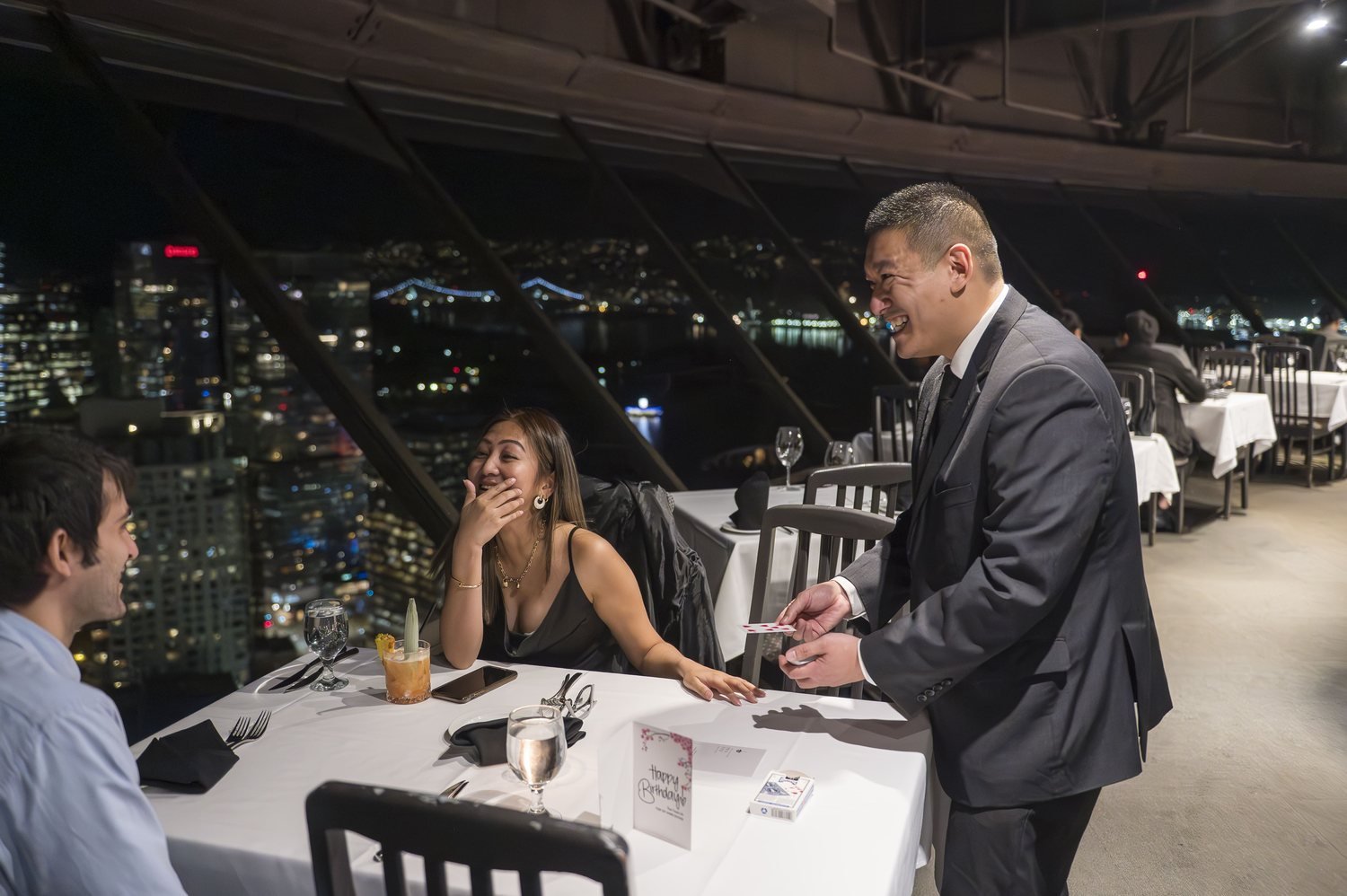 John performing private skyline dinner magic